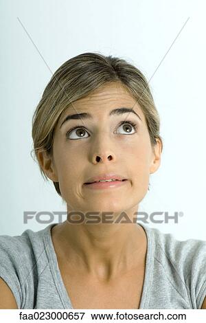 Stock Photo - Woman making face, portrait. Fotosearch