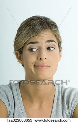 Stock Photography - Woman making face, portrait. Fotosearch