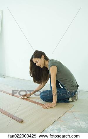 Woman staining slats of wood View Large Photo Image Stock Photography - Woman staining slats of wood. Fotosearch