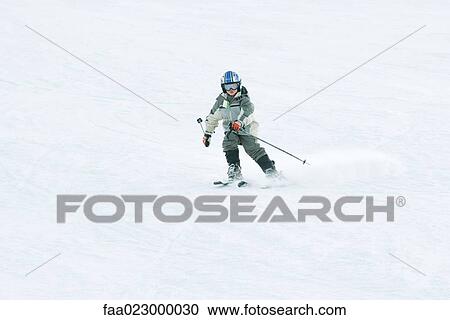 Young skier on ski slope, full length View Large Photo Image Stock Image - Young skier on ski slope, full length. Fotosearch