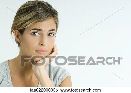 Young woman leaning head on hand, portrait View Large Photo Image Stock Photography - Young woman leaning head on hand, portrait. Fotosearch