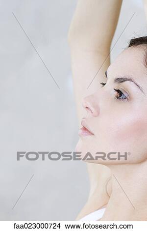 Young woman, profile, cropped view View Large Photo Image Picture - Young woman, profile, cropped view. Fotosearch
