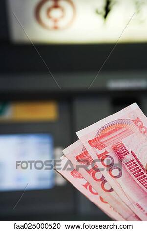 100 Yuan banknotes, AMT in background View Large Photo Image Stock Image - 100 Yuan banknotes, AMT in background. Fotosearch