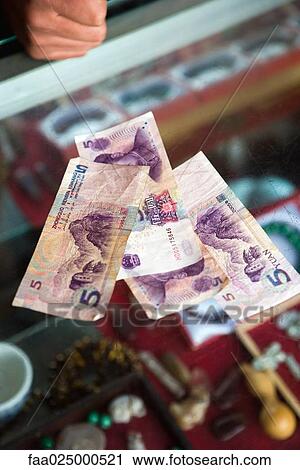 5 Yuan banknotes on counter View Large Photo Image Stock Image - 5 Yuan banknotes on counter. Fotosearch