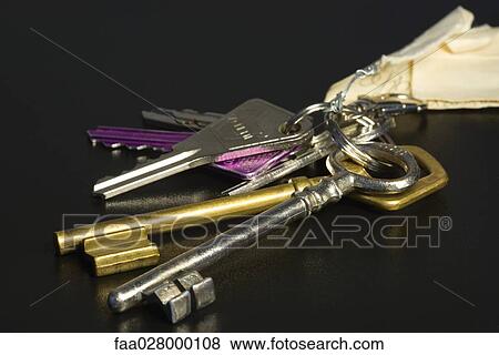 Assorted keys on key ring, close-up View Large Photo Image Stock Photo - Assorted keys on key ring, close-up. Fotosearch