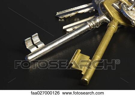 Assorted keys on keyring, close-up View Large Photo Image Stock Photograph - Assorted keys on keyring, close-up. Fotosearch
