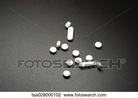 Assorted pills and tablets, close-up View Large Photo Image Stock Image - Assorted pills and tablets, close-up. Fotosearch