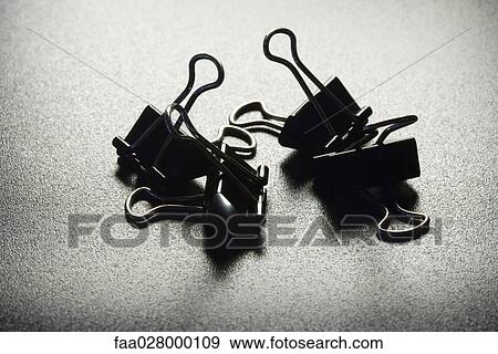 Binder clips, close-up View Large Photo Image Stock Photo - Binder clips, close-up. Fotosearch