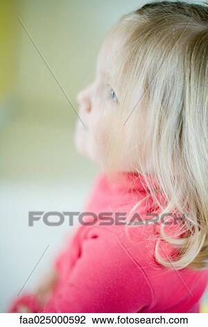 Blonde toddler girl looking up, side view View Large Photo Image Stock Image - Blonde toddler girl looking up, side view. Fotosearch