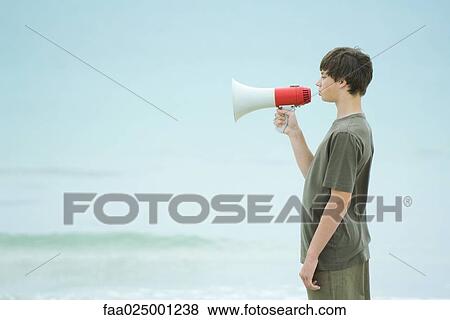 Boy using megaphone, side view View Large Photo Image Stock Photo - Boy using megaphone, side view. Fotosearch
