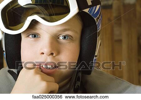 Boy wearing ski gear, portrait View Large Photo Image Stock Photograph - Boy wearing ski gear, portrait. Fotosearch