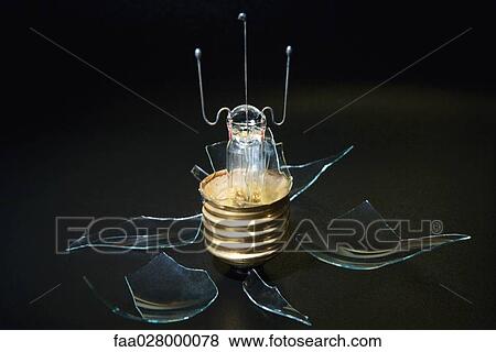 Broken light bulb, close-up View Large Photo Image Stock Photo - Broken light bulb, close-up. Fotosearch