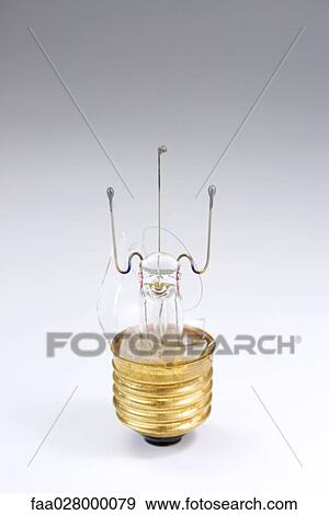 Broken light bulb, close-up View Large Photo Image Stock Photo - Broken light bulb, close-up. Fotosearch