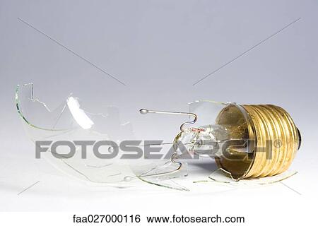 Broken light bulb, close-up View Large Photo Image Stock Photograph - Broken light bulb, close-up. Fotosearch
