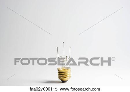Stock Photography - Broken light bulb, close-up. Fotosearch