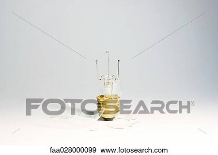 Broken lightbulb, close-up View Large Photo Image Stock Photo - Broken lightbulb, close-up. Fotosearch