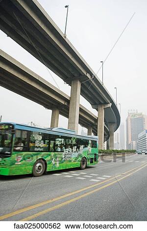 Bus under overpass View Large Photo Image Stock Image - Bus under overpass. Fotosearch