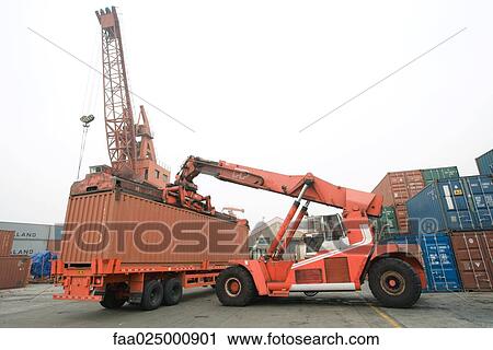 Cargo container being placed on truck bed View Large Photo Image Stock Image - Cargo container being placed on truck bed. Fotosearch
