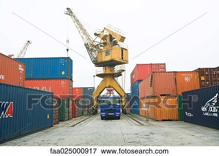 Cargo containers in shipyard View Large Photo Image Stock Photo - Cargo containers in shipyard. Fotosearch