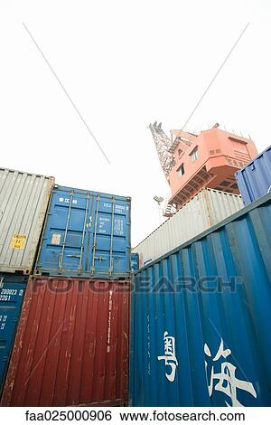 Cargo containers, low angle view View Large Photo Image Stock Photograph - Cargo containers, low angle view. Fotosearch
