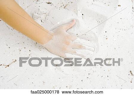 Child playing in sand, cropped view of hand View Large Photo Image Stock Photo - Child playing in sand, cropped view of hand. Fotosearch