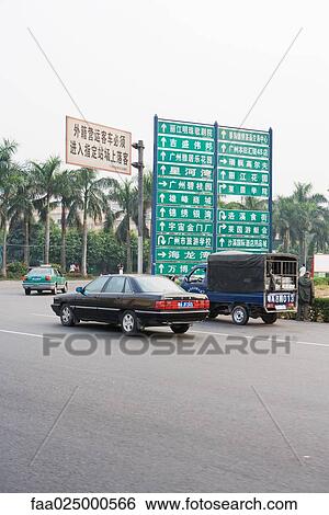 China, cars turning by directional signs View Large Photo Image Stock Photograph - China, cars turning by directional signs. Fotosearch