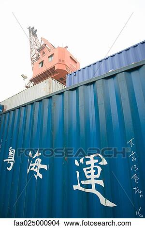 Picture - Chinese characters on cargo container, low angle view. Fotosearch