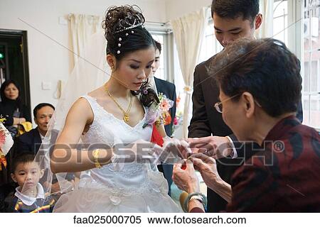 Chinese wedding, giving of jewelry to the bride View Large Photo Image Stock Photography - Chinese wedding, giving of jewelry to the bride. Fotosearch
