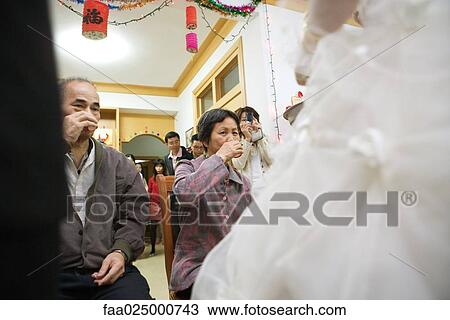 Stock Image - Chinese wedding tea ceremony. Fotosearch