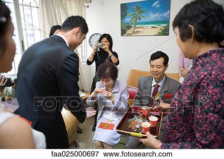 Chinese wedding tea ceremony View Large Photo Image Stock Photo - Chinese wedding tea ceremony. Fotosearch