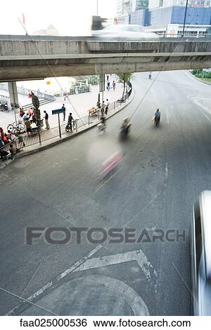 City activity under overpass View Large Photo Image Stock Photograph - City activity under overpass. Fotosearch