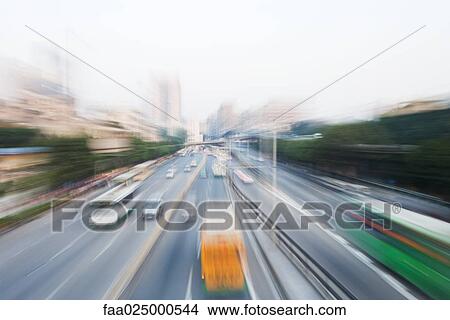 City thoroughfare, blurred motion View Large Photo Image Picture - City thoroughfare, blurred motion. Fotosearch