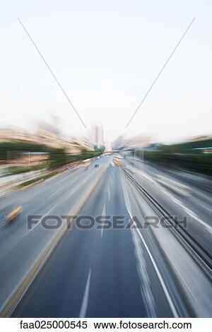 City thoroughfare, blurred motion View Large Photo Image Stock Photography - City thoroughfare, blurred motion. Fotosearch