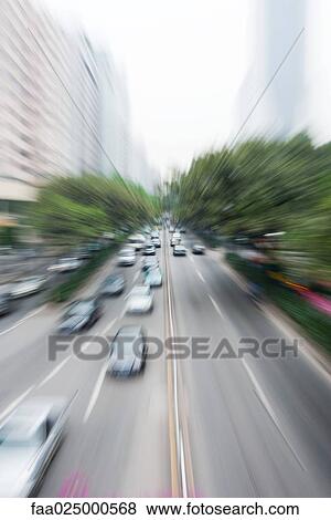 City thoroughfare, high angle view, blurred motion View Large Photo Image Stock Photo - City thoroughfare, high angle view, blurred motion. Fotosearch