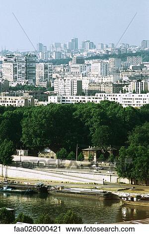 Cityscape and barges, River Seine, Paris, France View Large Photo Image Stock Image - Cityscape and barges, River Seine, Paris, France. Fotosearch