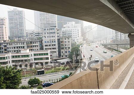 Cityscape viewed from overpass View Large Photo Image Stock Photo - Cityscape viewed from overpass. Fotosearch
