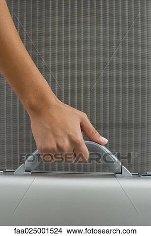 close-up, hand, briefcase, handle, holding, departure, anticipation View Large Photo Image Picture - close-up, hand, briefcase, handle, holding, departure, anticipation. Fotosearch