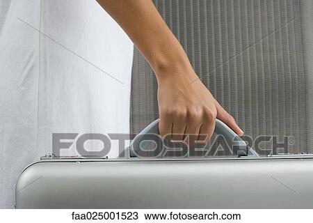 close-up, hand, woman, briefcase, handle, holding, cropped View Large Photo Image Stock Image - close-up, hand, woman, briefcase, handle, holding, cropped. Fotosearch