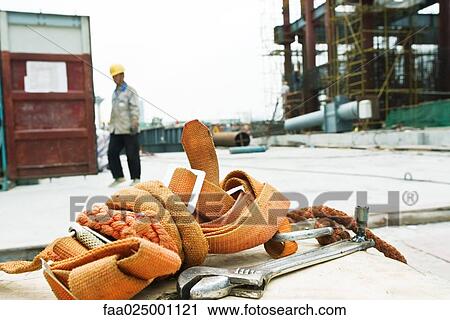 Construction site, close-up of safety harness lying on ground View Large Photo Image Stock Image - Construction site, close-up of safety harness lying on ground. Fotosearch