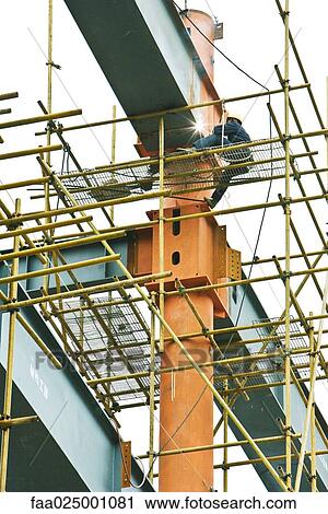 Stock Image - Construction worker on site. Fotosearch