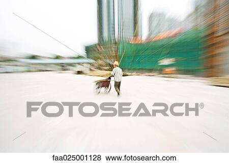 Construction worker working at construction site, blurred motion View Large Photo Image Stock Photo - Construction worker working at construction site, blurred motion. Fotosearch