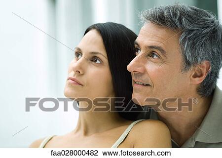 Couple, looking away, portrait View Large Photo Image Stock Image - Couple, looking away, portrait. Fotosearch