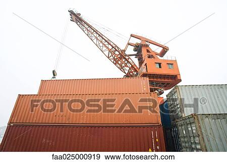 Crane and stack of cargo containers View Large Photo Image Stock Photo - Crane and stack of cargo containers. Fotosearch