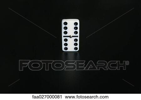 Domino standing on end, close-up View Large Photo Image Stock Image - Domino standing on end, close-up. Fotosearch