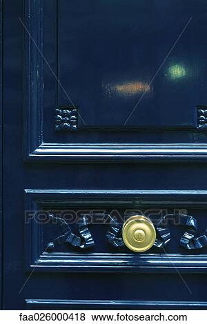 Door with ornate carving and knob, close-up View Large Photo Image Stock Photo - Door with ornate carving and knob, close-up. Fotosearch