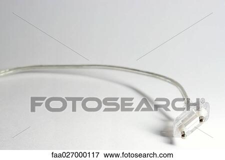Electric cord and plug, close-up View Large Photo Image Stock Photo - Electric cord and plug, close-up. Fotosearch