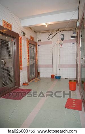 Empty corridor in apartment building View Large Photo Image Stock Photography - Empty corridor in apartment building. Fotosearch