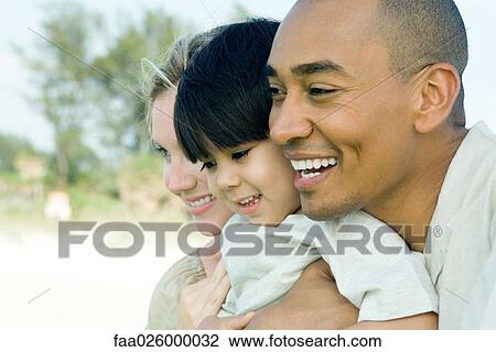Family cheek to cheek, smiling together, side view View Large Photo Image Stock Image - Family cheek to cheek, smiling together, side view. Fotosearch
