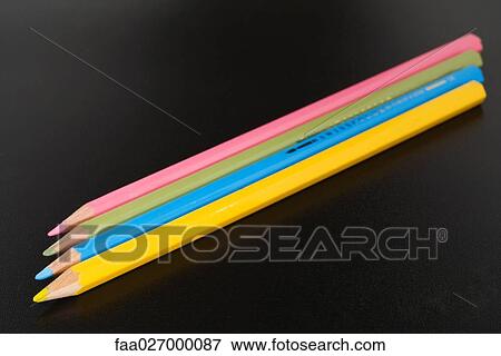 Four colored pencils side by side, close-up View Large Photo Image Stock Photo - Four colored pencils side by side, close-up. Fotosearch