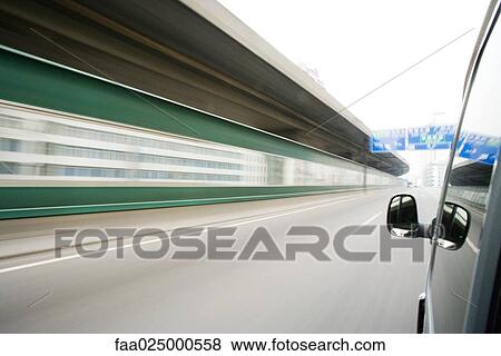 Freeway wall viewed from car window, blurred motion View Large Photo Image Stock Photo - Freeway wall viewed from car window, blurred motion. Fotosearch